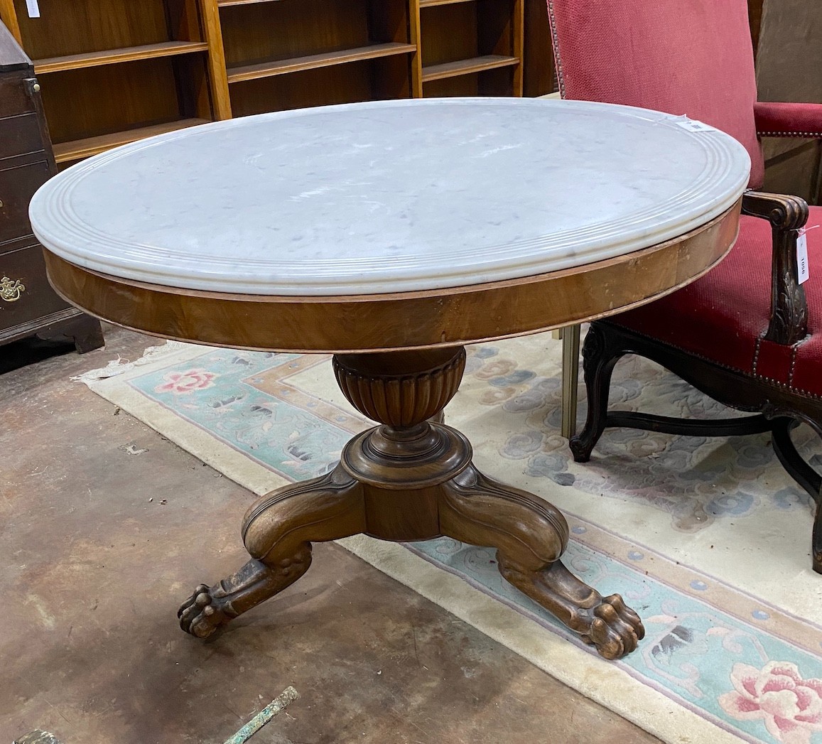 A 19th century French circular marble top mahogany centre table, diameter 98cm, height 73cm